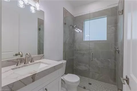 Bath - 3074 Pine Tree Dr, Naples, FL 34112 photo 4 of 5