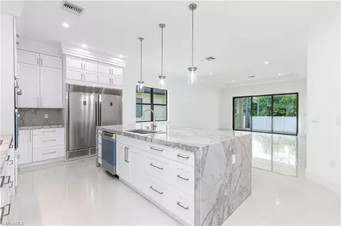 Kitchen - 3074 Pine Tree Dr, Naples, FL 34112 photo 1 of 4