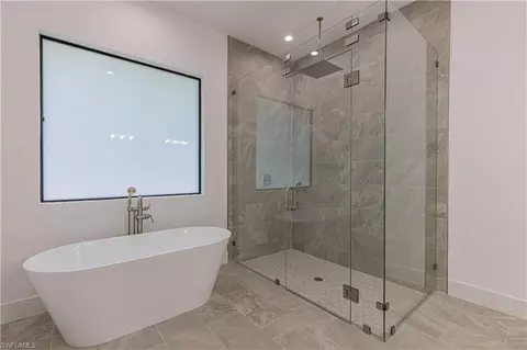 Bath - 3074 Pine Tree Dr, Naples, FL 34112 photo 3 of 5