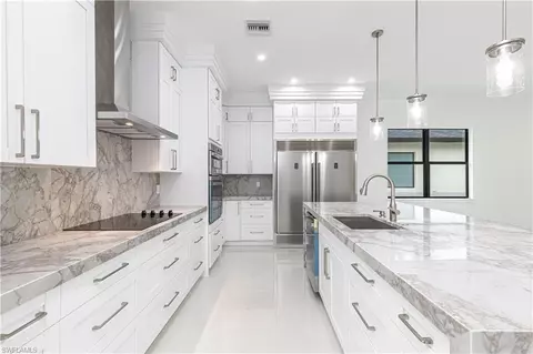 Kitchen - 3074 Pine Tree Dr, Naples, FL 34112 photo 2 of 4