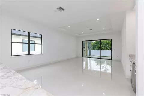 Living - 3074 Pine Tree Dr, Naples, FL 34112 photo 1 of 1