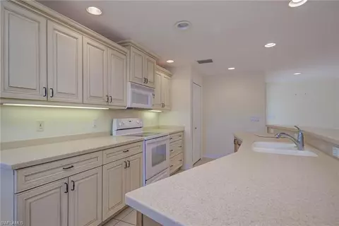 Kitchen - 155 Flame Vine Dr, Naples, FL 34110 photo 2 of 3