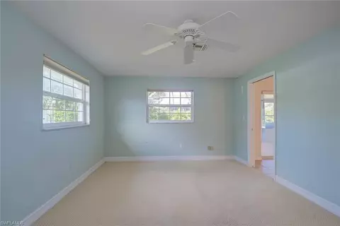 Bedroom - 155 Flame Vine Dr, Naples, FL 34110 photo 1 of 4