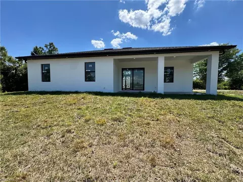 Exterior - 1173 Ebers St E, Lehigh Acres, FL 33974 photo 5 of 6