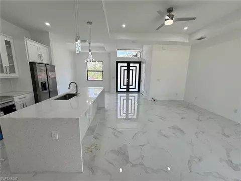 Living - 1173 Ebers St E, Lehigh Acres, FL 33974 photo 2 of 2