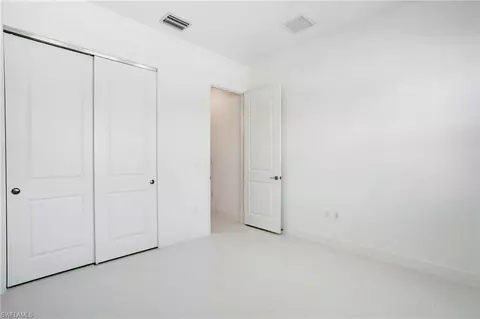 Bedroom - 11523 Jacaranda Dr, Naples, FL 34120 photo 8 of 8