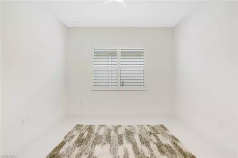 Bedroom - 11523 Jacaranda Dr, Naples, FL 34120 photo 4 of 8