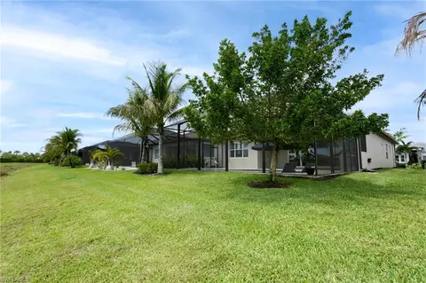 Exterior - 11523 Jacaranda Dr, Naples, FL 34120 photo 4 of 11