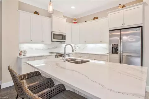 6908 Cay Ct, Naples, FL 34113