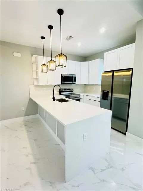 Kitchen - 7942 13th Pl, Labelle, FL 33935 photo 1 of 2