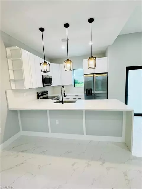 Kitchen - 7942 13th Pl, Labelle, FL 33935 photo 2 of 2