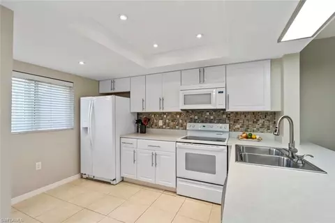 Kitchen - 138 Cypress Way E #404, Naples, FL 34110 photo 3 of 6