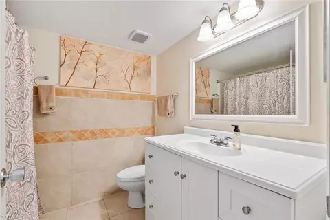 Bath - 138 Cypress Way E #404, Naples, FL 34110 photo 2 of 2