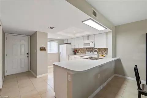 Kitchen - 138 Cypress Way E #404, Naples, FL 34110 photo 1 of 6