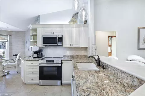 Kitchen - 21707 Sungate Ct, Estero, FL 33928 photo 3 of 5
