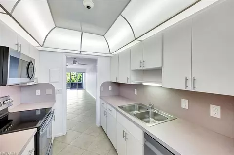 Kitchen - 820 Ketch Dr #7, Naples, FL 34103 photo 2 of 3