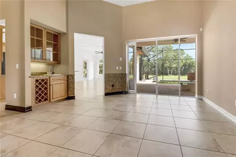 Living - 415 Saddlebrook Ln, Naples, FL 34110 photo 1 of 8