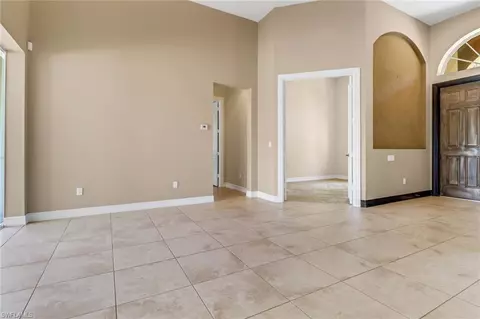 Living - 415 Saddlebrook Ln, Naples, FL 34110 photo 2 of 8