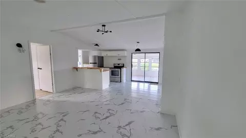 Living - 1055 7th St, Okeechobee, FL 34974 photo 1 of 2