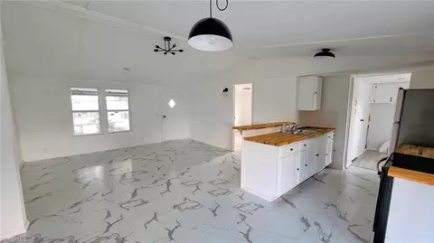 Living - 1055 7th St, Okeechobee, FL 34974 photo 2 of 2