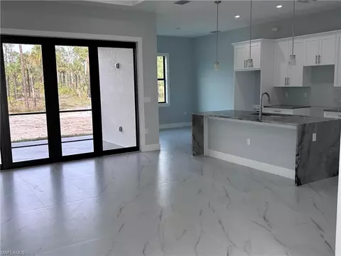 Living - 4891 20th St NE, Naples, FL 34120 photo 2 of 2