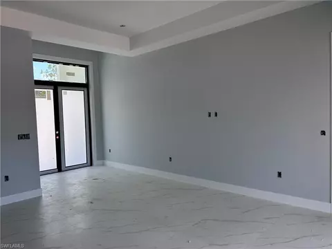 Living - 4891 20th St NE, Naples, FL 34120 photo 1 of 2