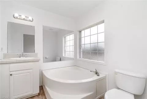 Bath - 7679 Farrell Rd, Bokeelia, FL 33922 photo 1 of 4