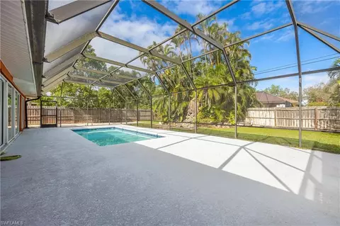Exterior - 71 Mentor Dr, Naples, FL 34110 photo 6 of 11