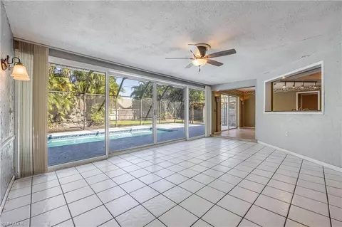 Living - 71 Mentor Dr, Naples, FL 34110 photo 6 of 6