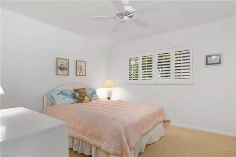 Bedroom - 37 High Point Cir E #401, Naples, FL 34103 photo 3 of 4