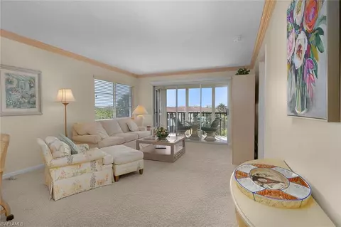 Living - 37 High Point Cir E #401, Naples, FL 34103 photo 2 of 2