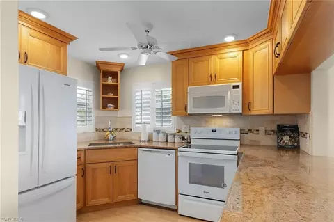 Kitchen - 37 High Point Cir E #401, Naples, FL 34103 photo 2 of 3