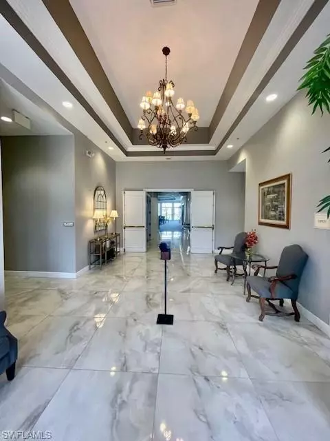 Entry Way - 37 High Point Cir E #401, Naples, FL 34103 photo 1 of 2