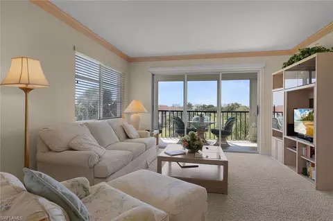Living - 37 High Point Cir E #401, Naples, FL 34103 photo 1 of 2