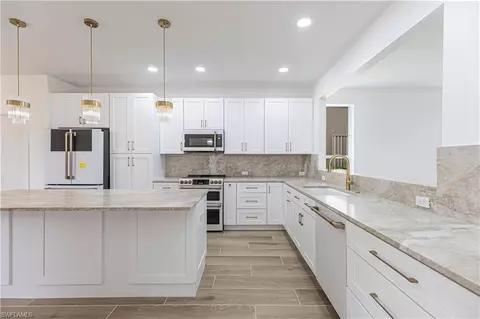 9217 Troon Lakes Dr, Naples, FL 34109