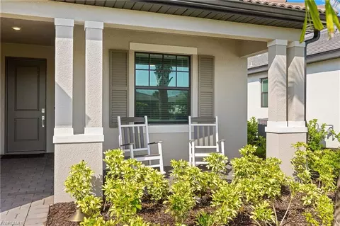Exterior - 18587 Ives Dr, Estero, FL 33928 photo 4 of 16