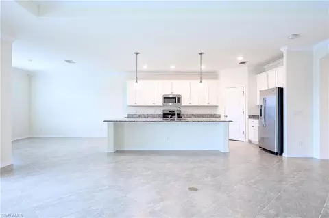 Living - 4604 Abaca Cir, Naples, FL 34119 photo 2 of 4