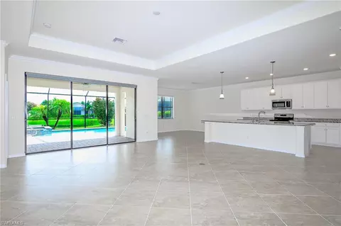 Living - 4604 Abaca Cir, Naples, FL 34119 photo 3 of 4