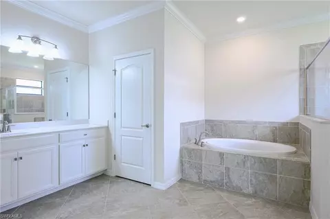 Bath - 4604 Abaca Cir, Naples, FL 34119 photo 2 of 4