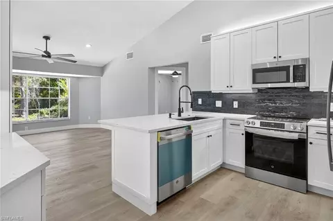 Kitchen - 6035 Painted Leaf Ln, Naples, FL 34116 photo 2 of 3
