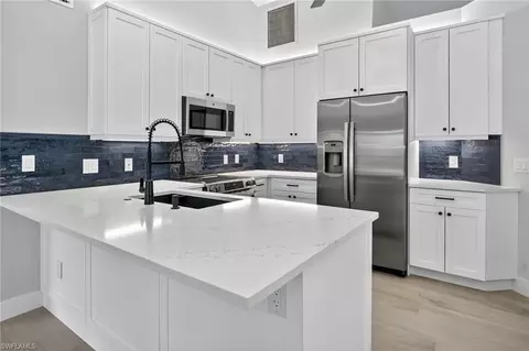 Kitchen - 6035 Painted Leaf Ln, Naples, FL 34116 photo 1 of 3
