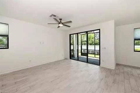 Living - 7546 Rockefeller Dr, Naples, FL 34119 photo 2 of 4