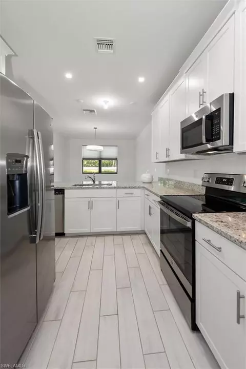 Kitchen - 7546 Rockefeller Dr, Naples, FL 34119 photo 3 of 3