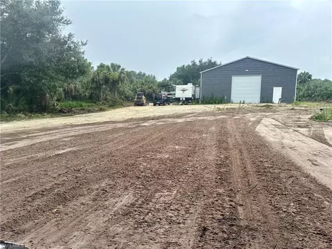 Exterior - 2868 16th Ave SE, Naples, FL 34117 photo 5 of 7