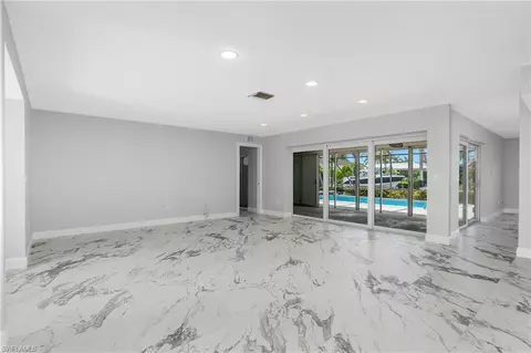 Living - 2340 Snook Dr, Naples, FL 34102 photo 2 of 10