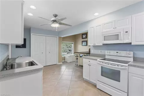 Kitchen - 6060 Painted Leaf Ln, Naples, FL 34116 photo 8 of 8