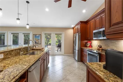 Kitchen - 6060 Painted Leaf Ln, Naples, FL 34116 photo 3 of 8