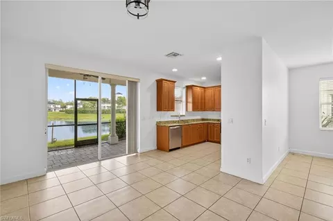 Living - 7029 Ambrosia Ln #606, Naples, FL 34119 photo 2 of 3