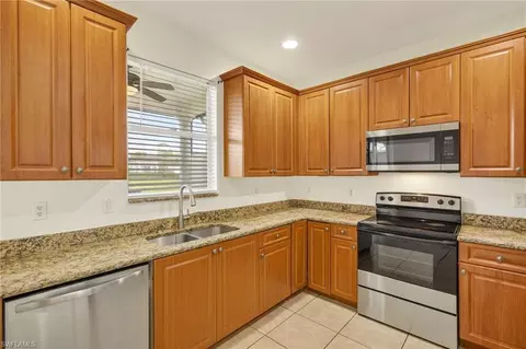 Kitchen - 7029 Ambrosia Ln #606, Naples, FL 34119 photo 3 of 3