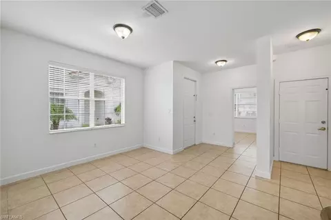 Entry Way - 7029 Ambrosia Ln #606, Naples, FL 34119 photo 1 of 1